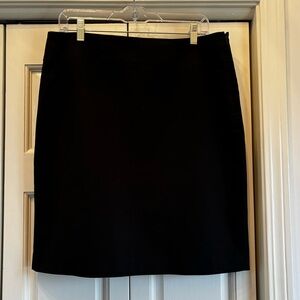 Tahari black pencil skirt with double kick vent in the back, 12